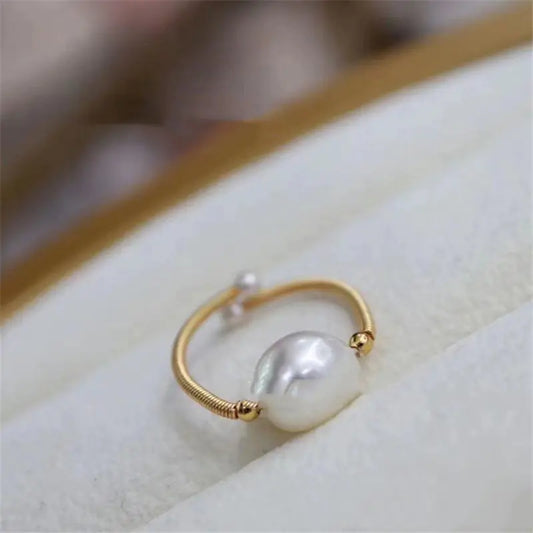 14K Gold Pearl Ring with Winding Design